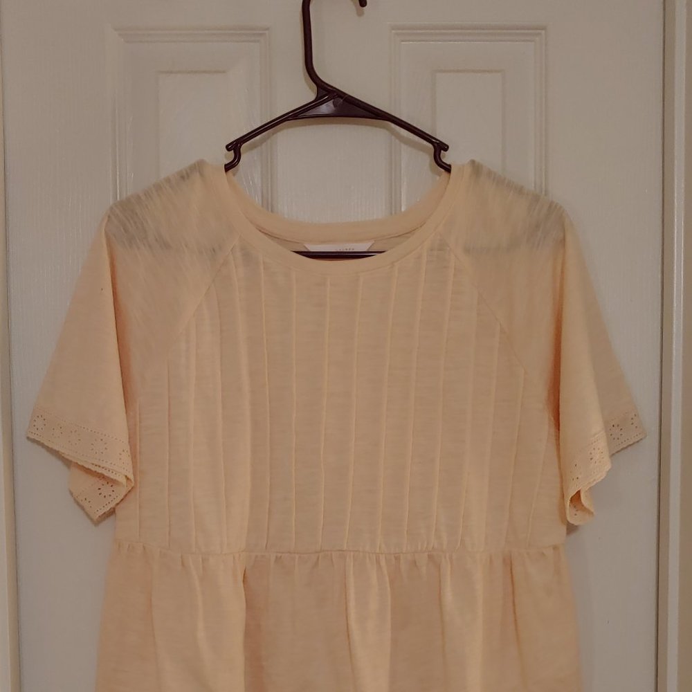 Lauren Conrad cream colored shirt